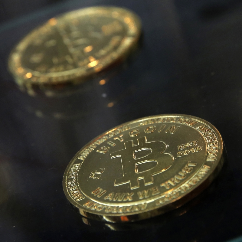 Cryptocurrency exchanges across Africa are making it possible for people to invest in crypto tokens. Photo - AP - Kin Cheung